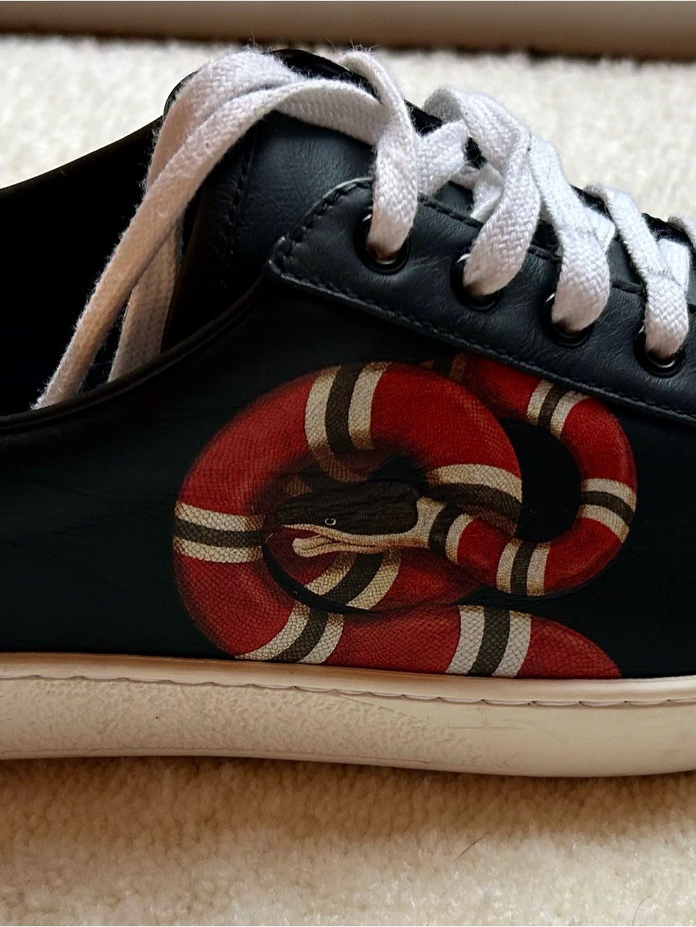 Men’s Gucci Black Leather Kingsnake sneakers